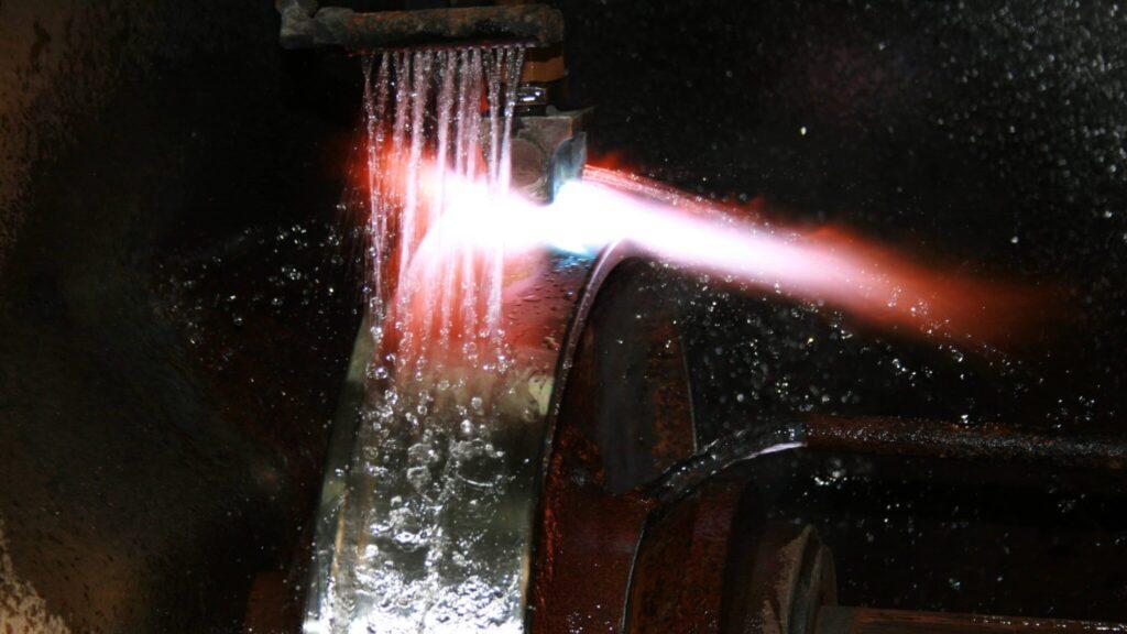Machining a metal wheel for an industrial kiln car