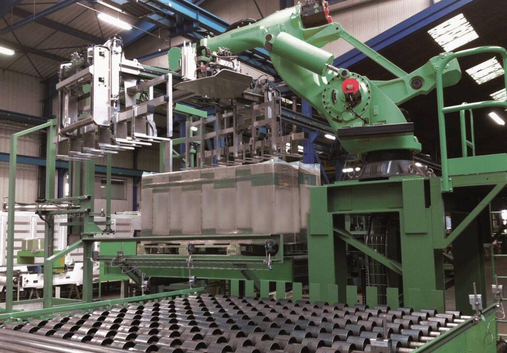 Robots industriels équipés de préhenseurs sur une ligne de manutention